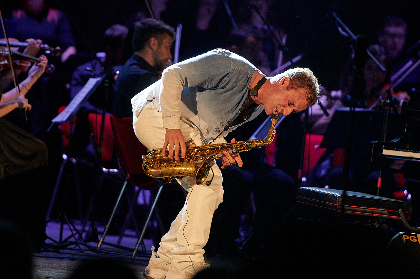 Sapphire Adizes performing saxophone on stage